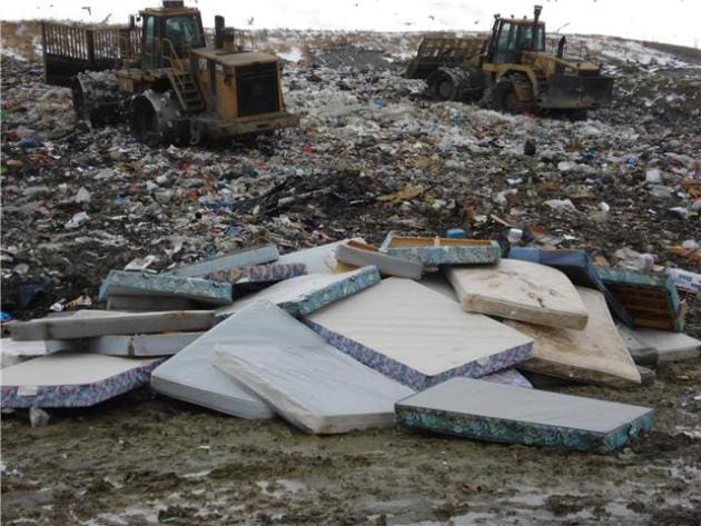 mattresses in a landfill